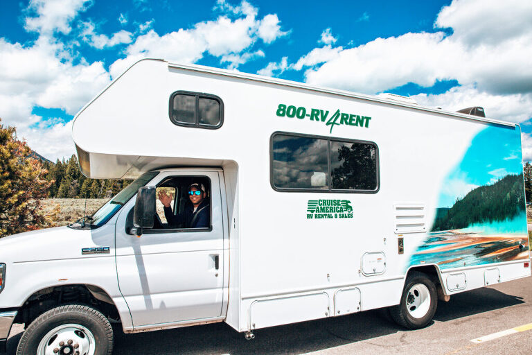 RV with man behind the wheel